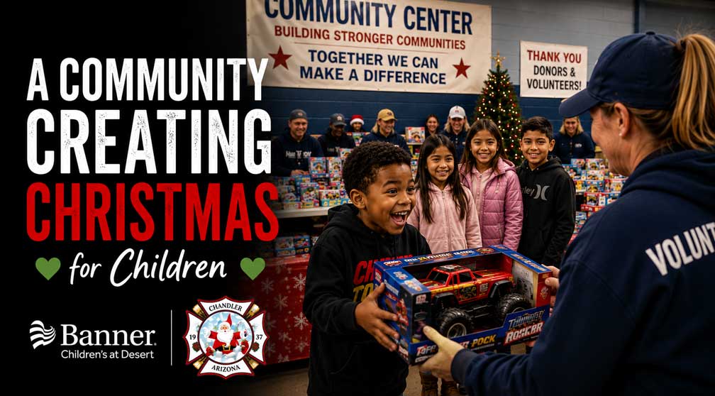 Volunteer presents a toy to a smiling child during Rockin' for Kids' annual holiday toy drive benefiting local children and families.