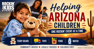 Smiling Arizona child holding a teddy bear while Rockin' for Kids volunteers provide toys, food, water and support through community charity events.