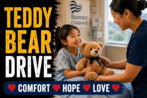 Child receiving a teddy bear from a Rockin' for Kids volunteer during the Teddy Bear Drive, bringing comfort, hope and love to children in need.